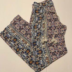 Loose fitting floral pants with tassel ties